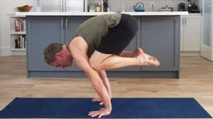 Jason Crandell in bakasana