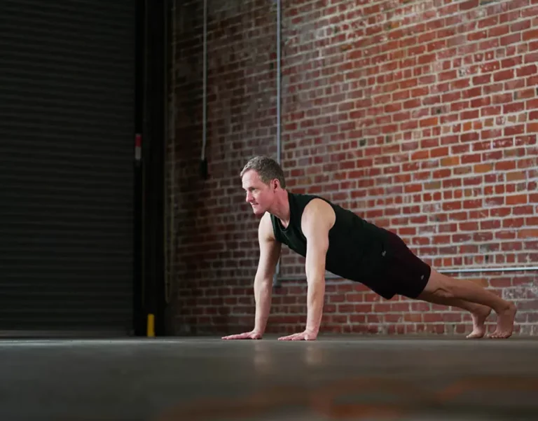 Jason Crandell in Plank Pose