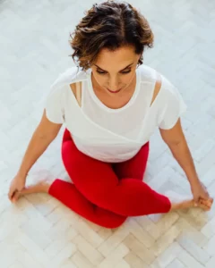 Andrea Ferretti in Gomukhasana, photographed from above