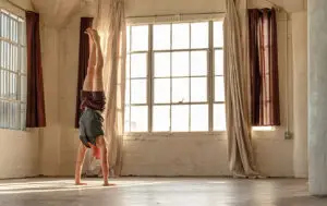 Jason Crandell doing a handstand