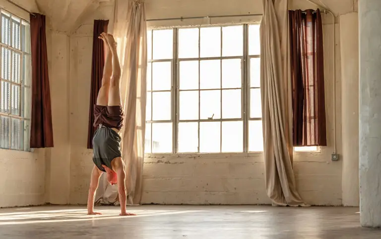 Jason Crandell doing a handstand