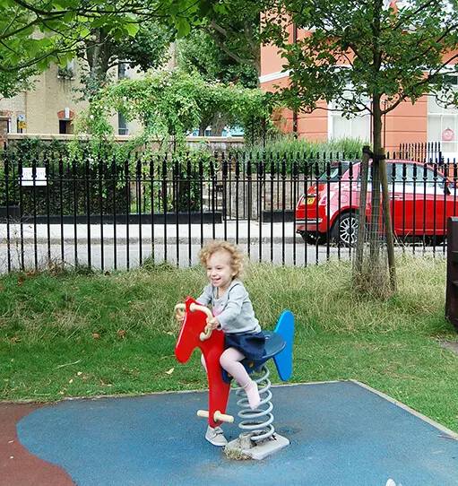 Sofia-Rose on a horse rocker