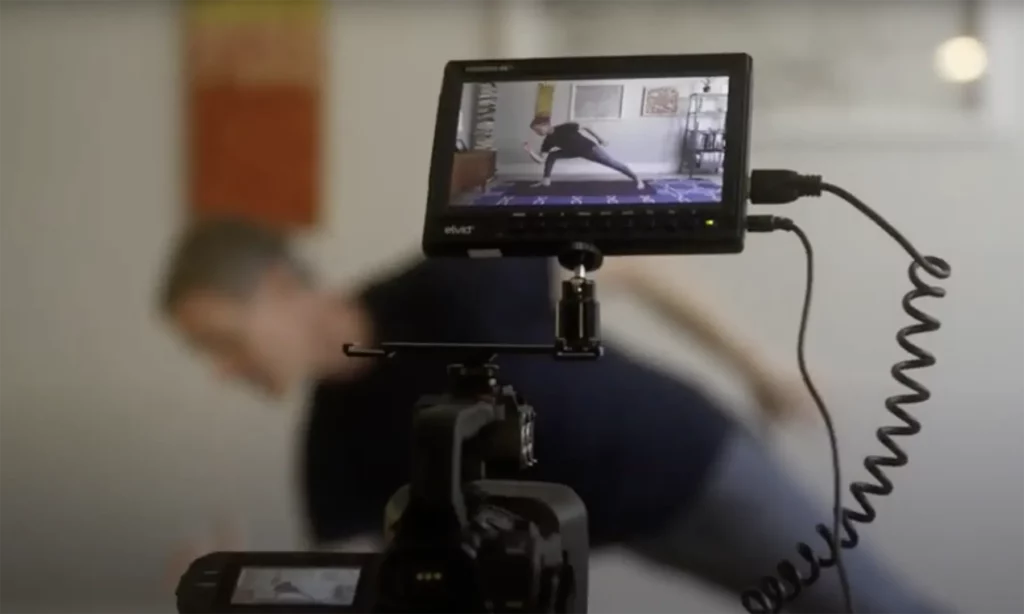 Jason Crandell through camera viewfinder during a photoshoot
