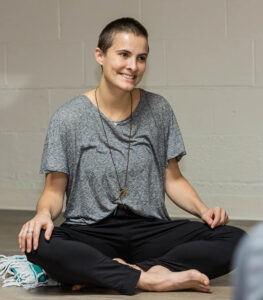 Dr. Kyla Pearce who teaches yoga for traumatic brain injury (TBI)