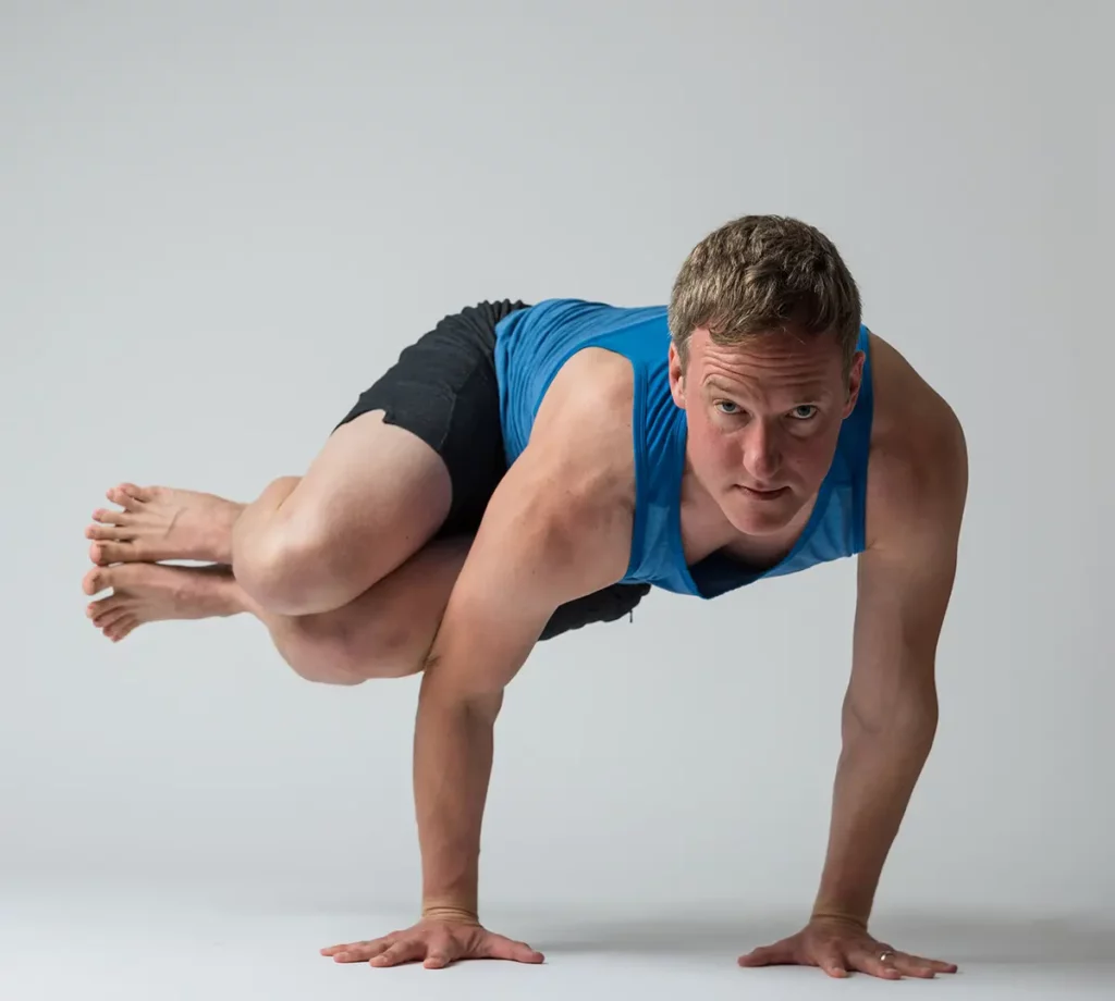 Jason Crandell in Parsva Bakasana